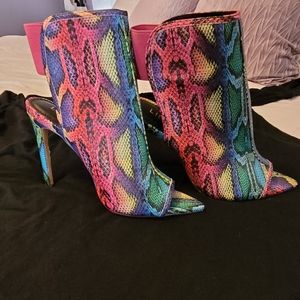 Only worn one time for very short period! Size 7 Liliana heels. Multi color
